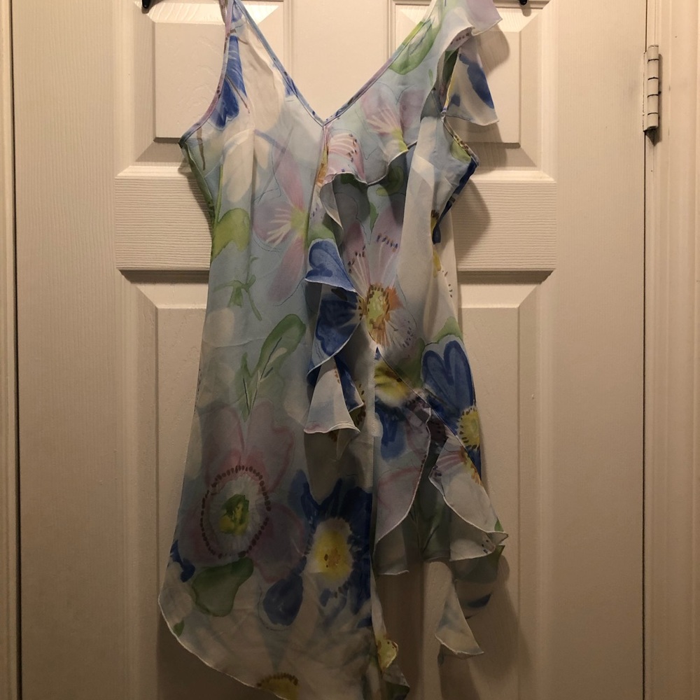 Beautiful Camisole top that is 100 percent silk. Only wore twice. Excellent!!!
